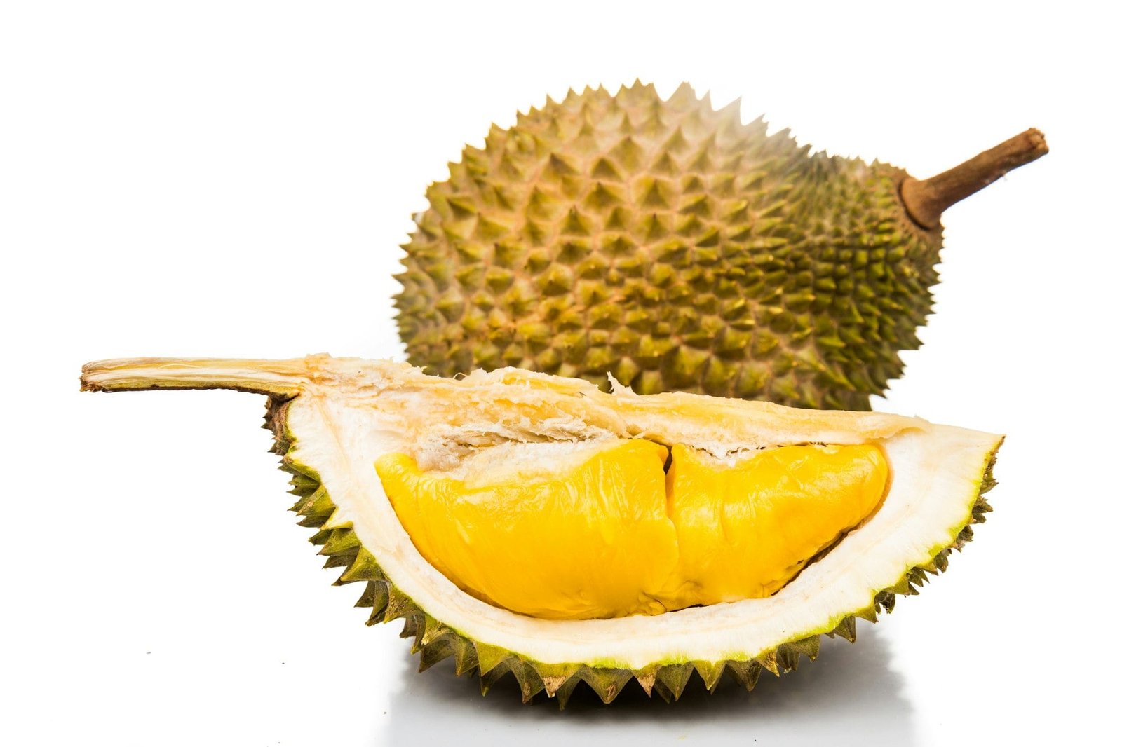 Freshly harvested durian fruit with delicious golden yellow soft flesh
